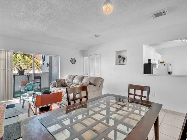 1126 NW 125th Path # 203, Miami FL 33182