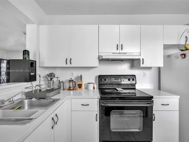 1126 NW 125th Path # 203, Miami FL 33182