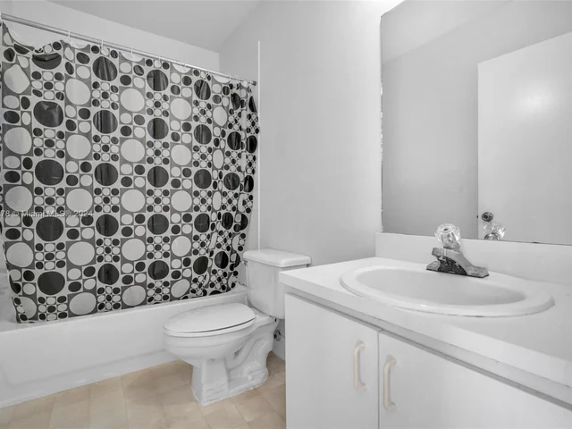 1126 NW 125th Path # 203, Miami FL 33182