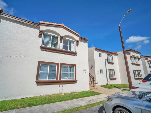 1126 NW 125th Path # 203, Miami FL 33182