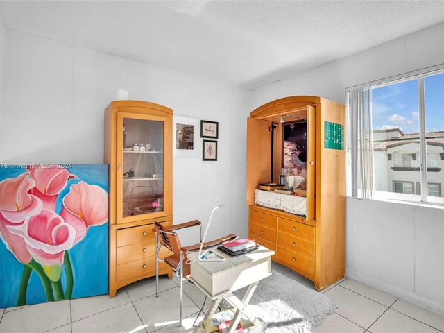 1126 NW 125th Path # 203, Miami FL 33182