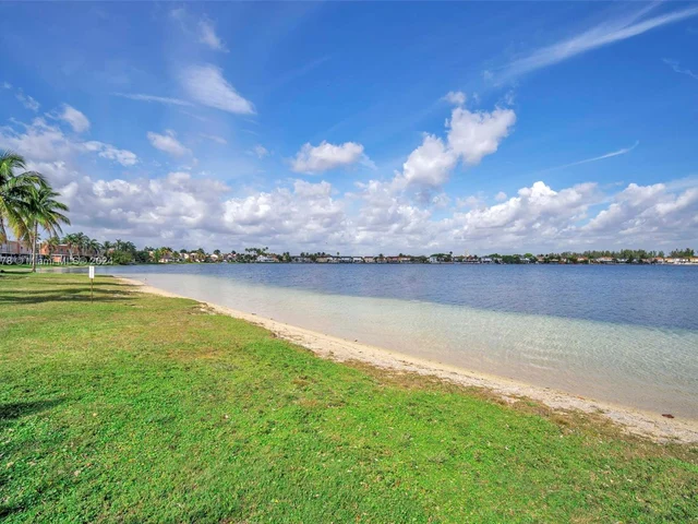 1126 NW 125th Path # 203, Miami FL 33182