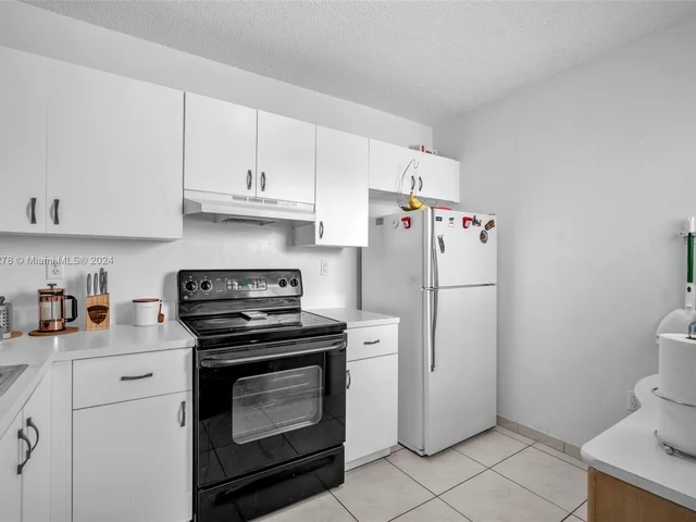 1126 NW 125th Path # 203, Miami FL 33182