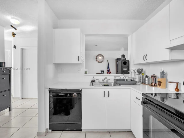 1126 NW 125th Path # 203, Miami FL 33182