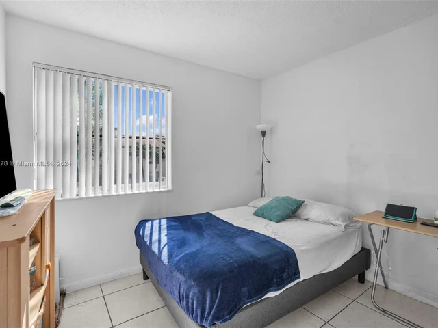 1126 NW 125th Path # 203, Miami FL 33182