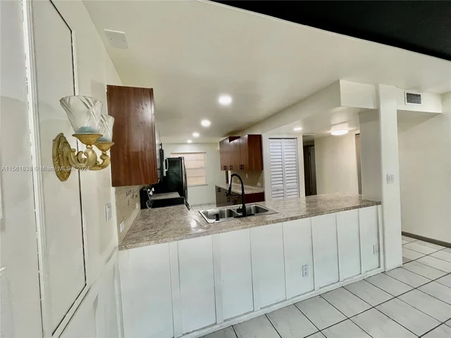 2067 Coral Ridge Dr # N202, Coral Springs FL 33071