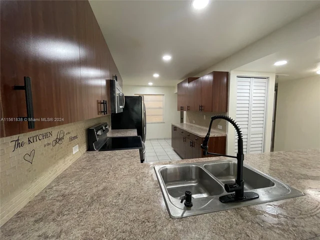 2067 Coral Ridge Dr # N202, Coral Springs FL 33071