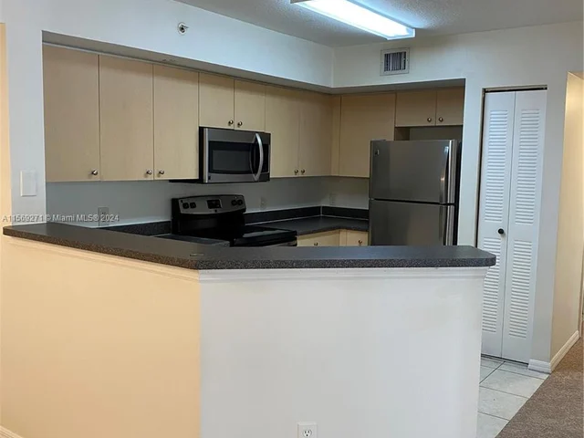 4151 San Marino # 207, West Palm Beach FL 33409